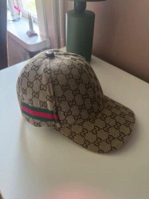 GG keps - Snygg GG keps med mönster, väldigt bra skick!