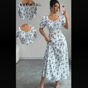 Blommig långklänning från SHEIN - Superfin långklänning från SHEIN med blått blommönster på vit botten. Klänningen har puffiga kortärmar, smockad överdel och söt fyrkantig ringning. Perfekt för sommarens alla tillfällen och ger en romantisk vibe.