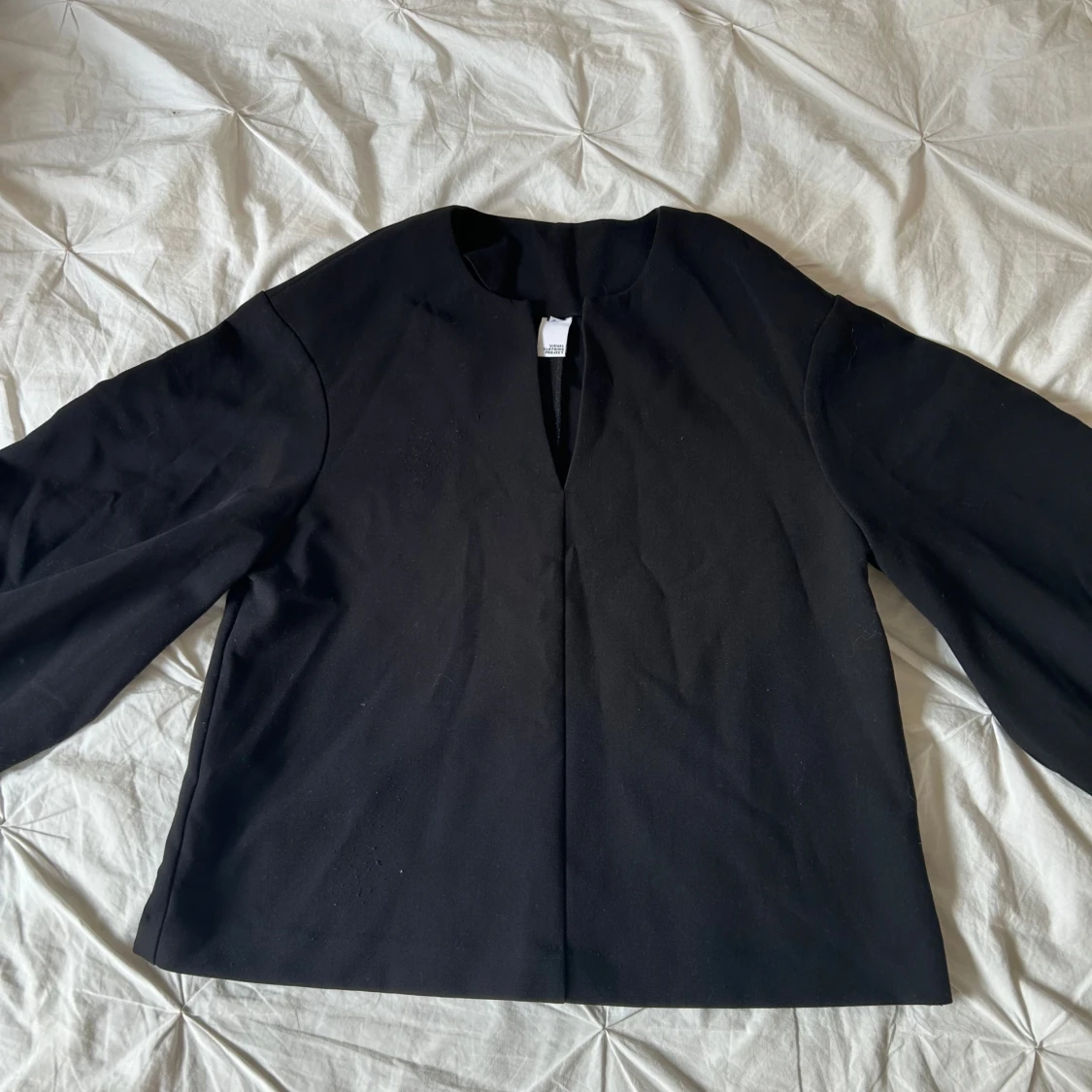 Svart blus från Visual Clothing Project