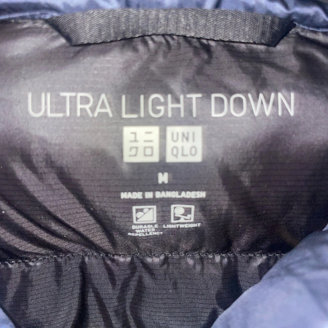 Mörkblå dunväst från Uniqlo - 1