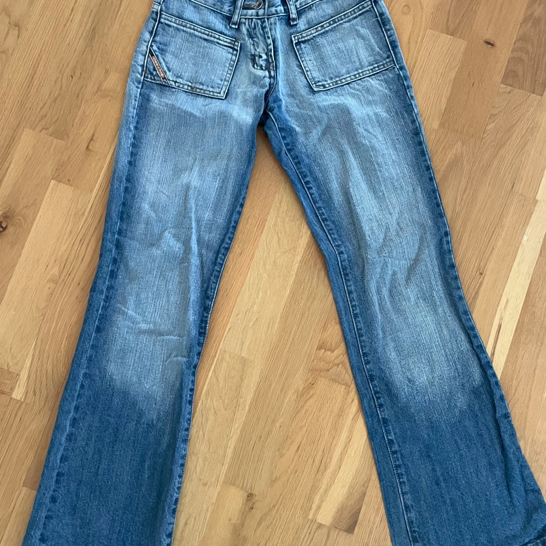 Lågmidjade bootcut jeans med fickor Creator