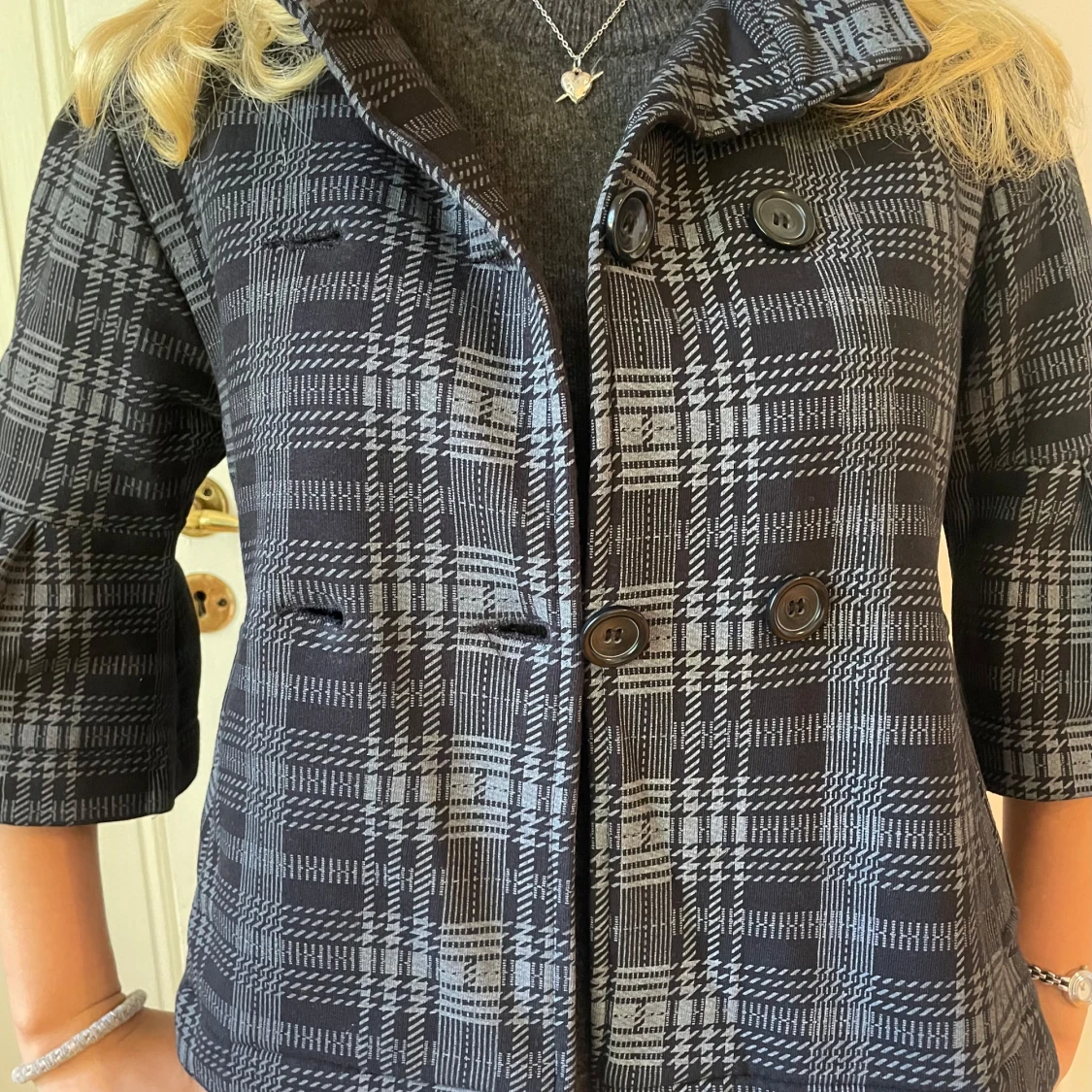 Jacka med trekvartsĂ€rmarđđ