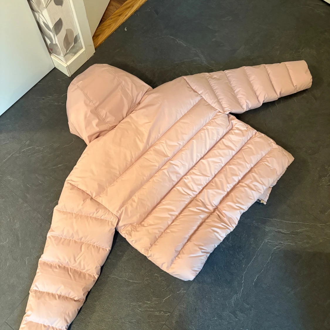 Ljusrosa pufferjacka från Nike