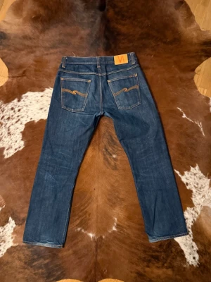 Selvage Nudie AvrageJoe - Tjena! Säljer dessa vintage nudie jeans, byxorna är i storlek W34/L32 och är i fint skick, hör av dig vid funderingar!🙌