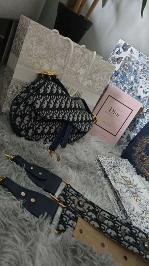 Dior Saddle Bag - selling my Dior saddle bag with a wide strapband barely used  Size is medium