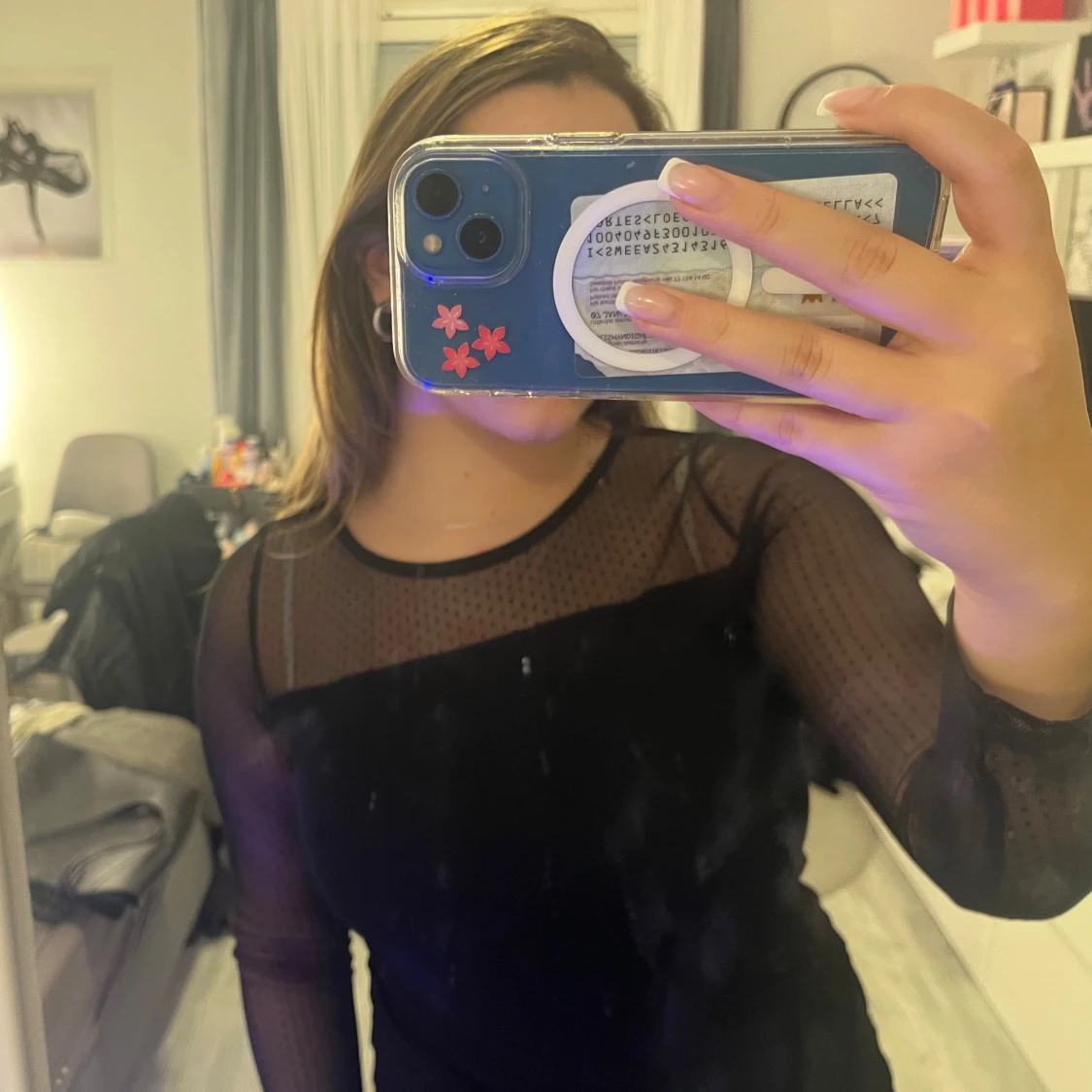 Svart meshblus med prickigt mönster KappAhl