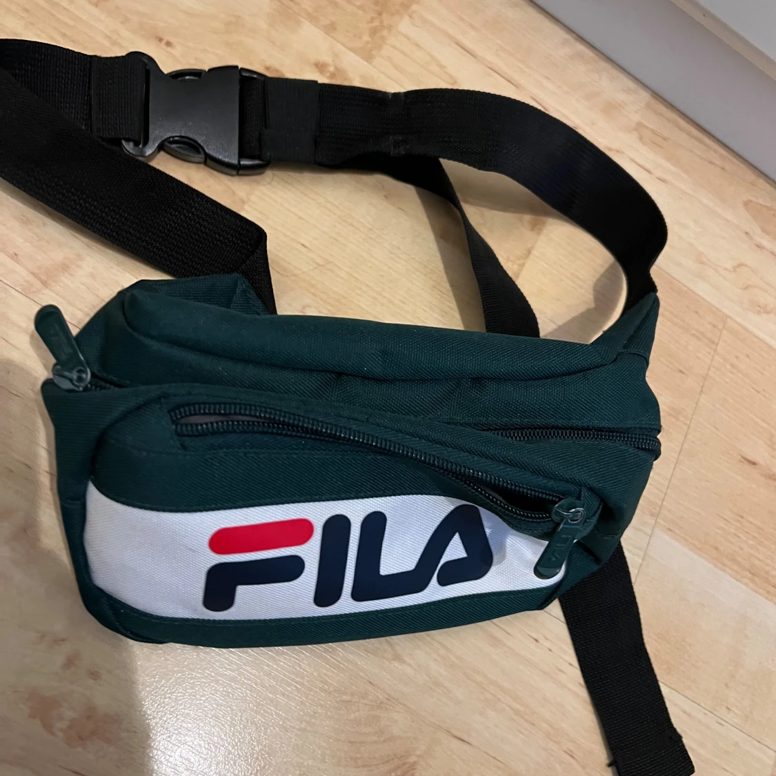 Fila Axel/midjeväska