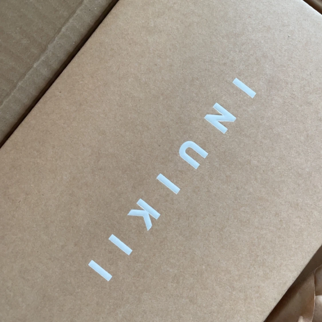 Inuikii tofflor i storlek 38