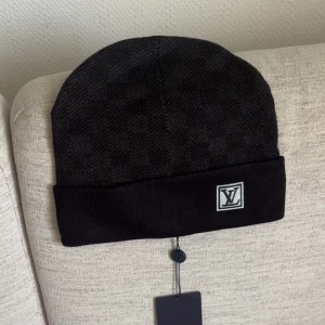 L mössa svart - Helt ny 