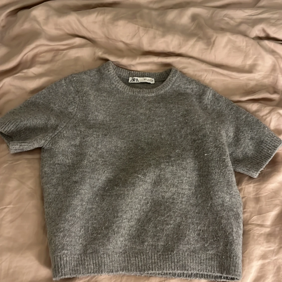 Grå stickad tröja från Zara