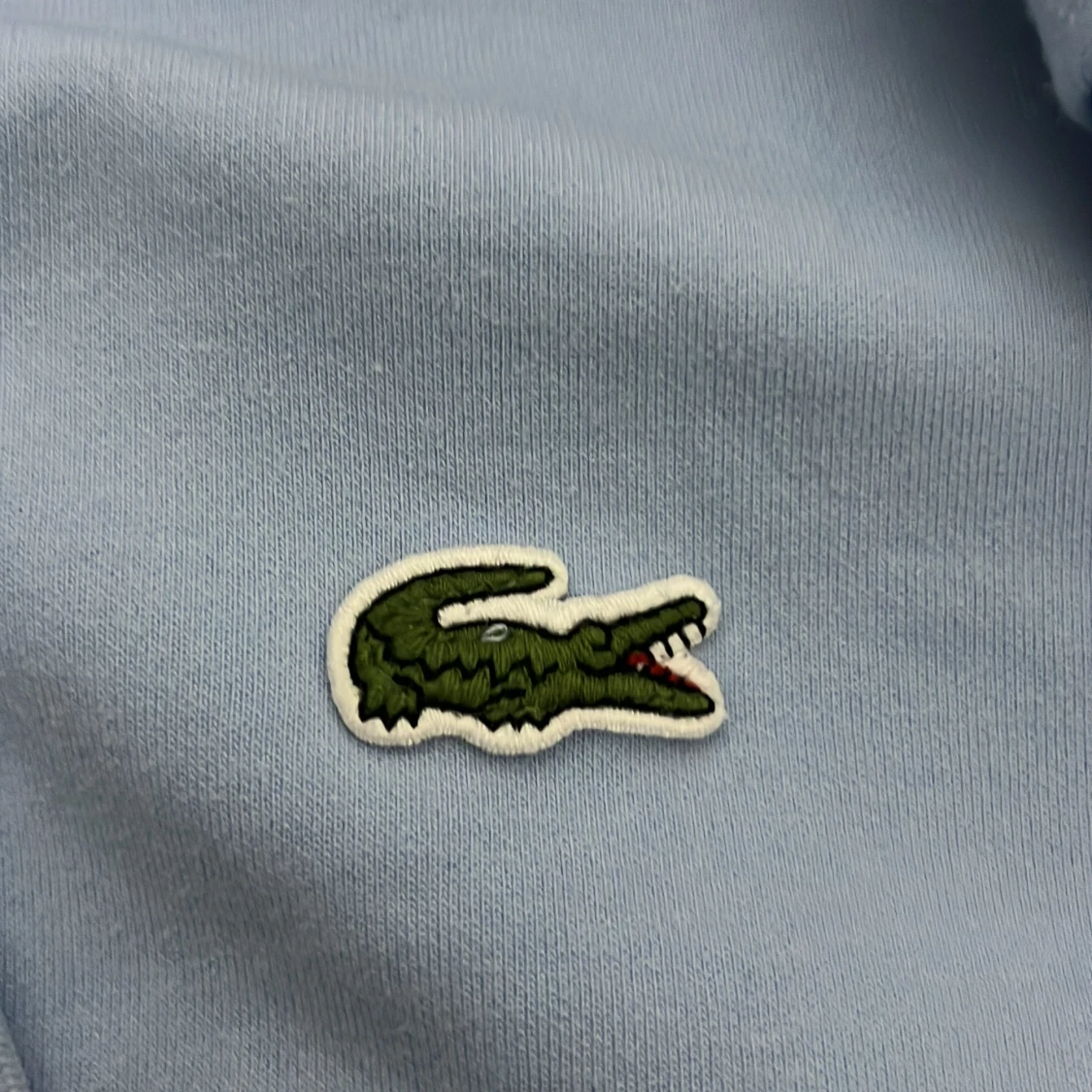 Ljusblå hoodie från Lacoste - 2