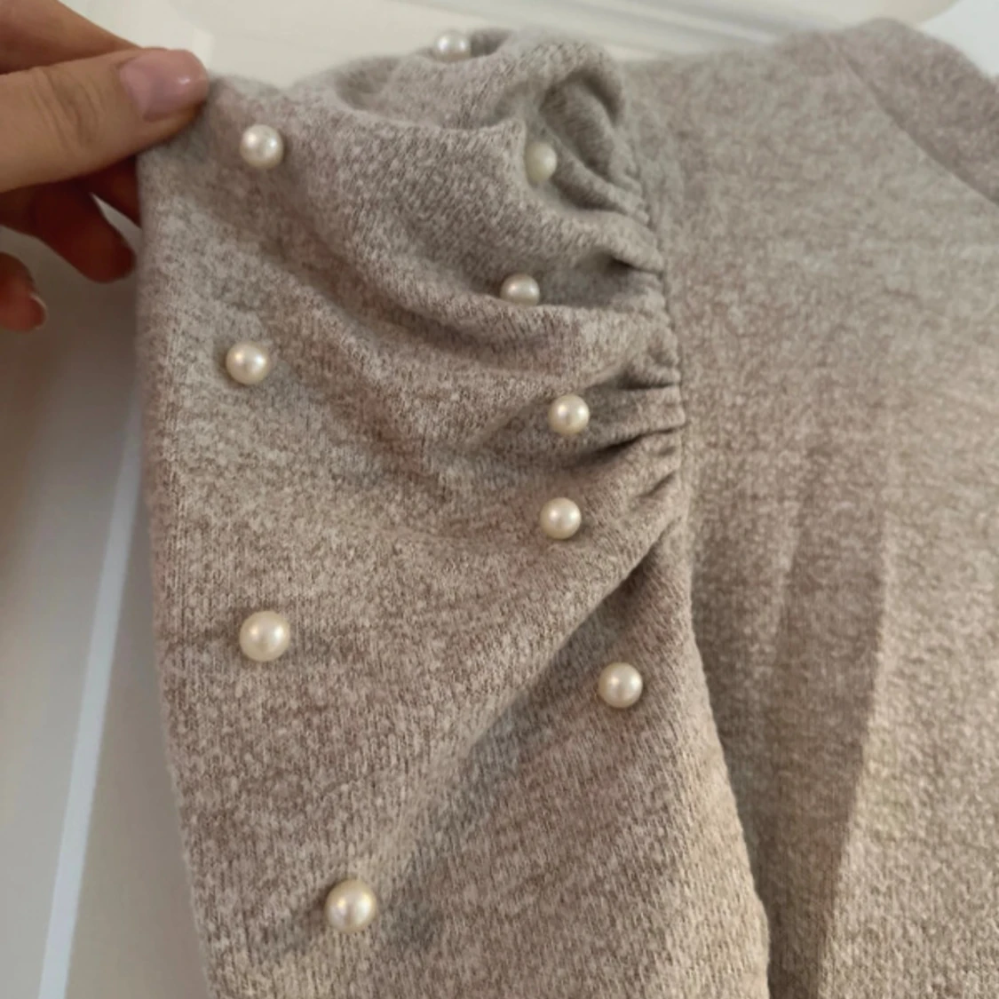 Stickad beige tröja 