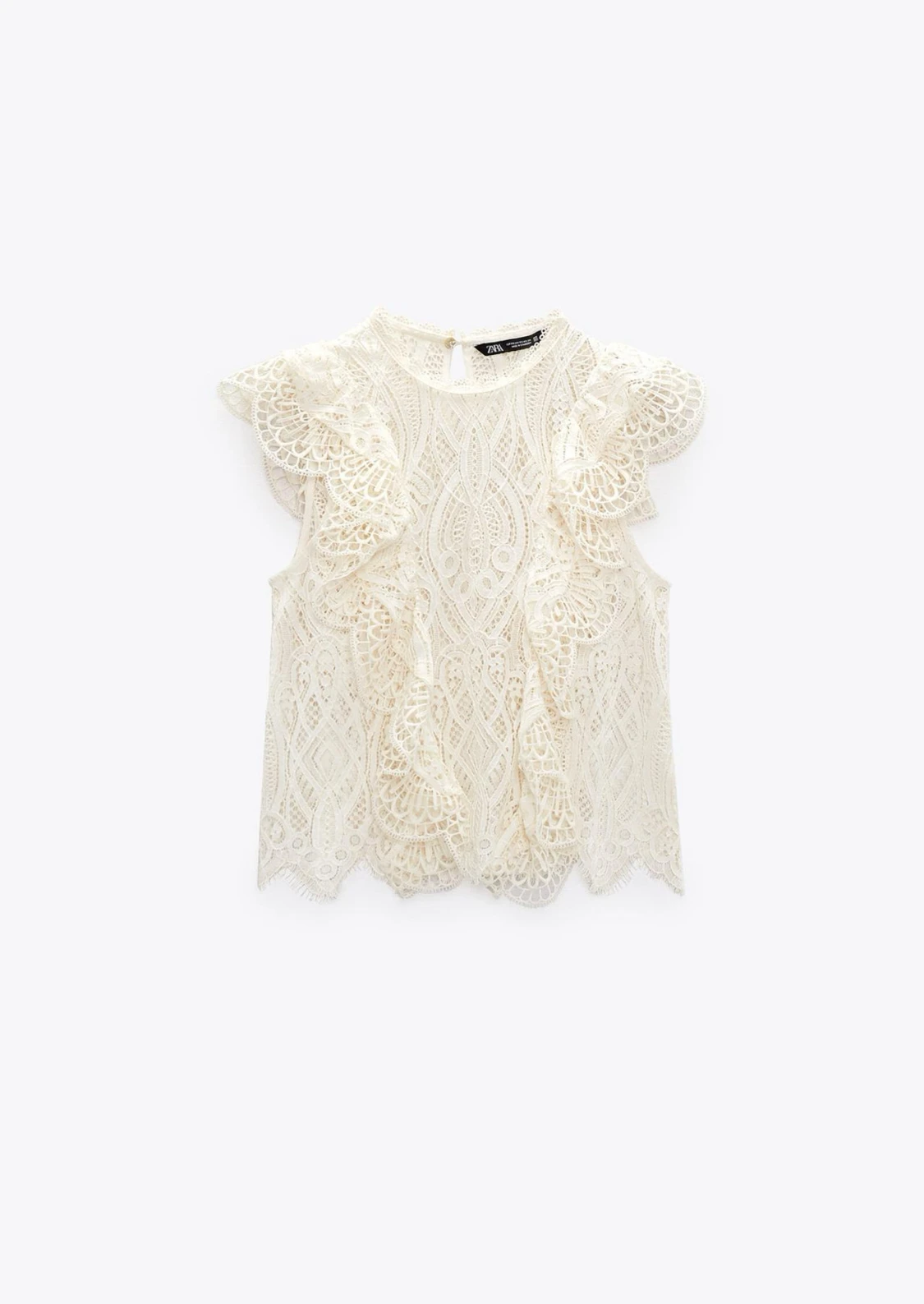 Vit spetsblus med volang från Zara