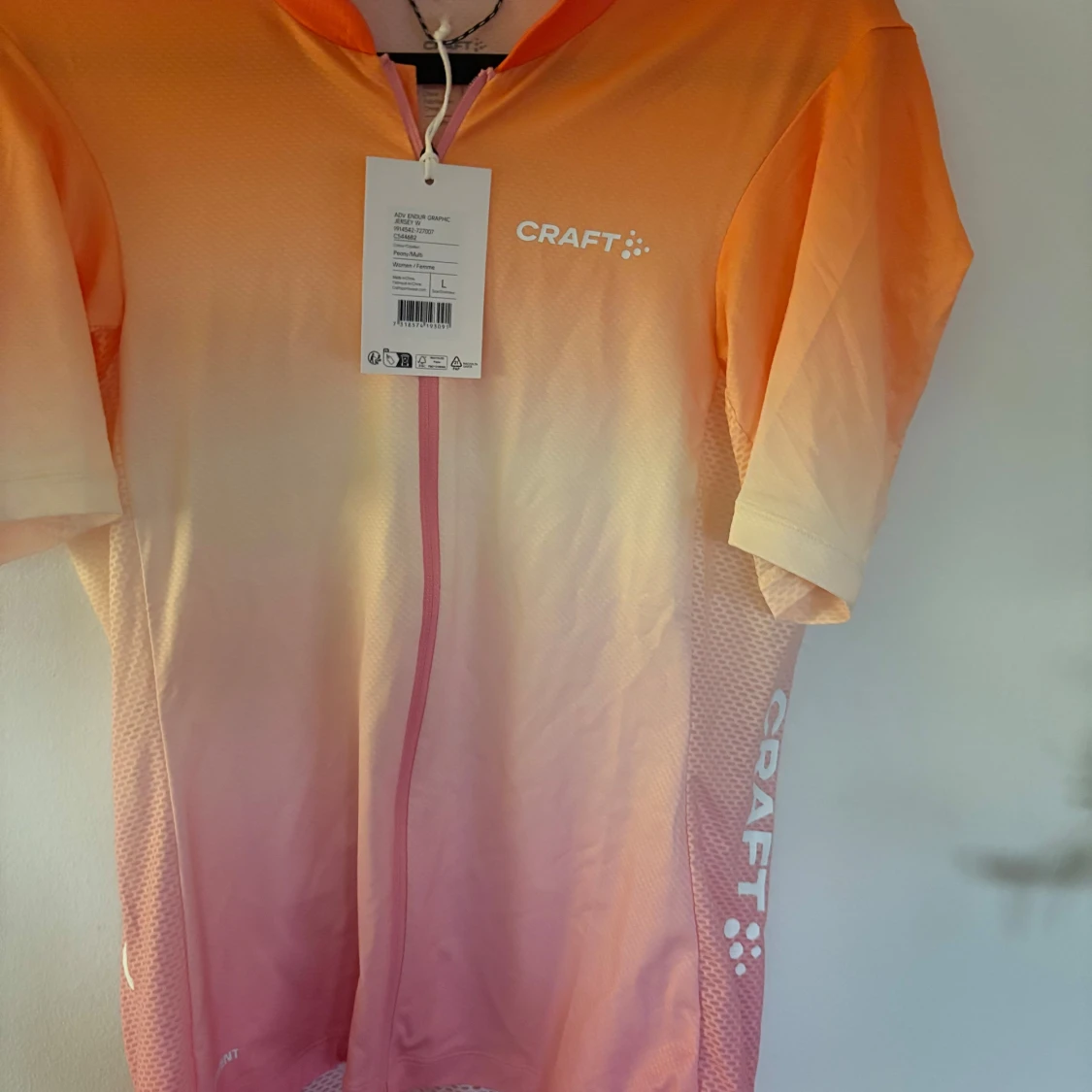 Craft cykeltröja orange/rosa - 1