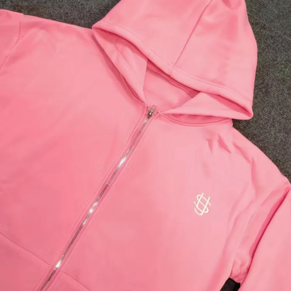 Rosa hoodie med dragkedja och huva