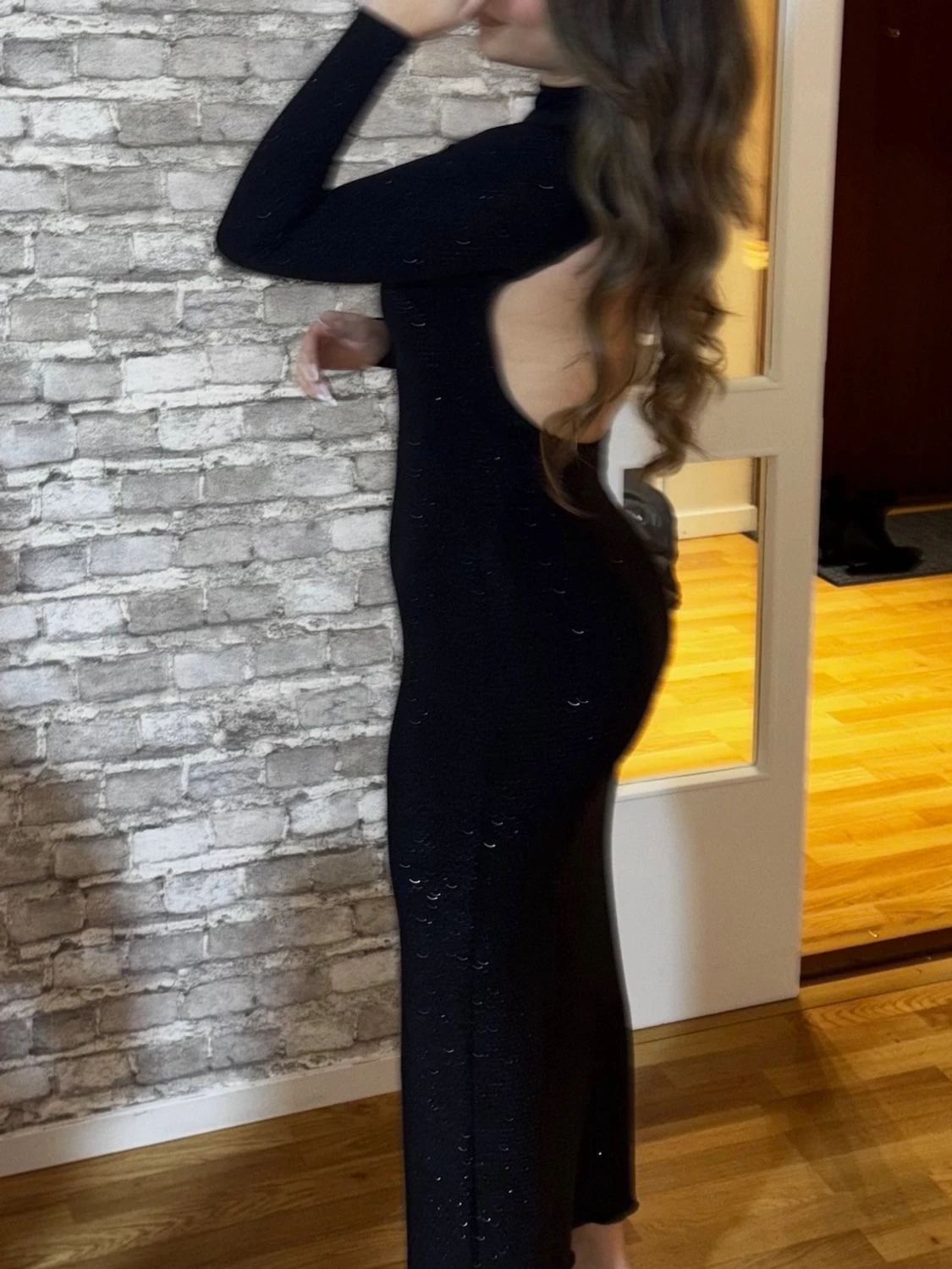 Glittrig svartklänning - 2