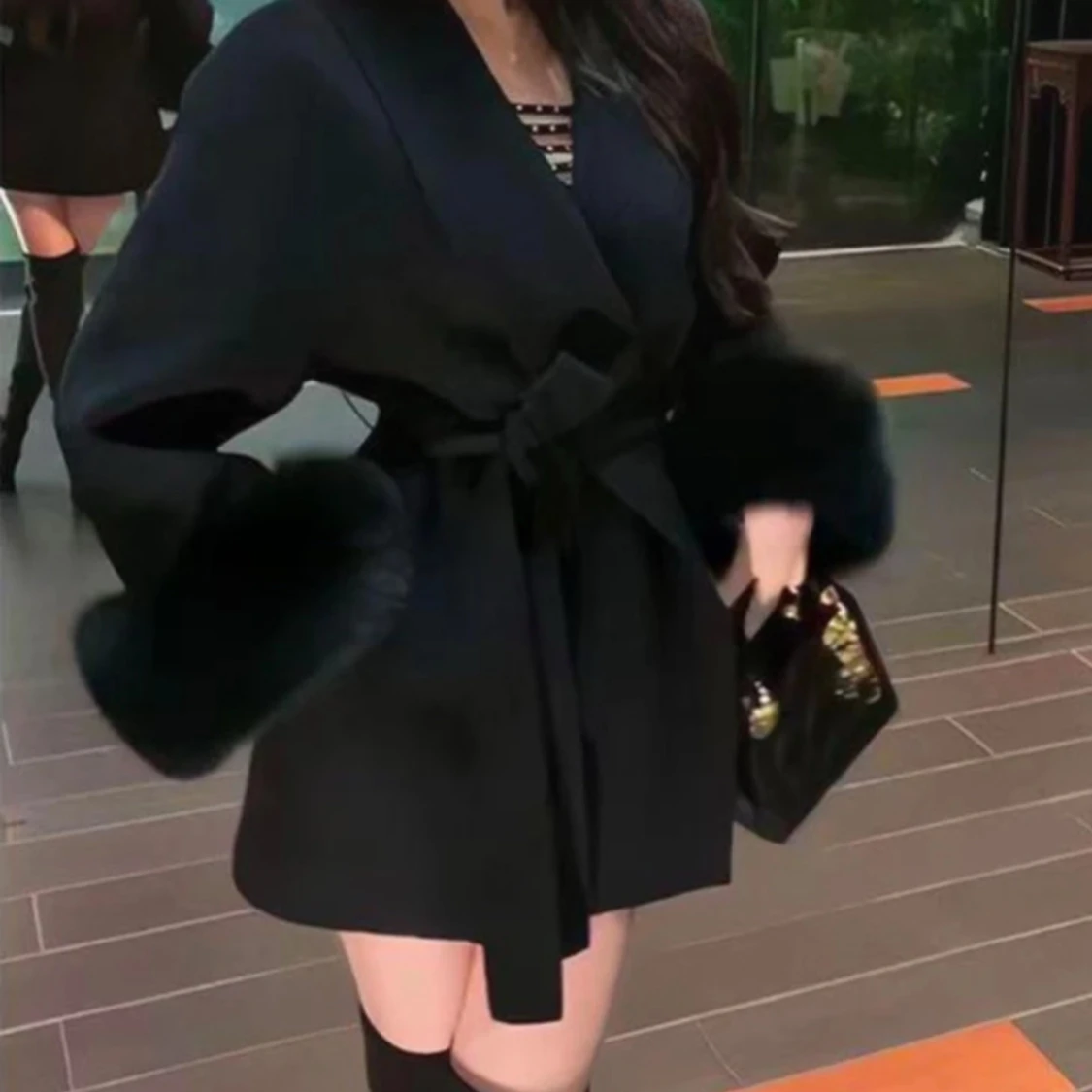 Svart pälsjacka från Dennis Maglic