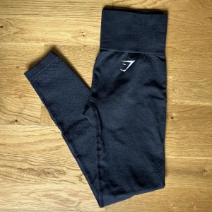 Gymshark vital seamless XS - Svarta/grå vital seamless tights från gymshark i storlek XS i bra skick. 