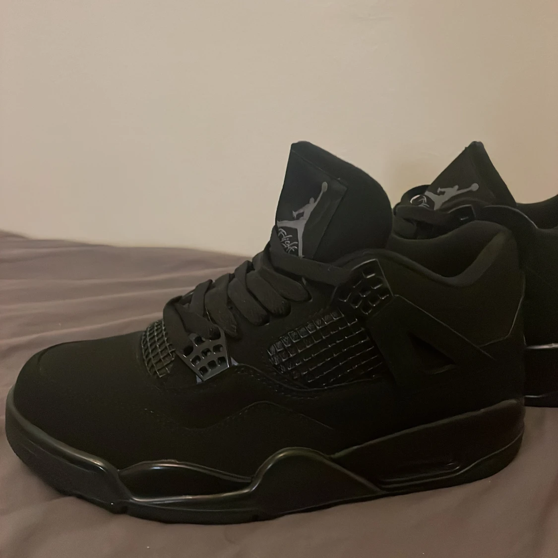 Svarta Nike Jordan 4 sneakers