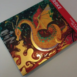 Drake: Pussel med 100 bitar och en bok på 10 sidor - Upptäck en magisk värld med detta färgsprakande drakpussel (100 bitar) och en tillhörande bok på 10 sidor. Perfekt för dig som gillar fantasy, äventyr och kreativa utmaningar. Passar både unga och unga vuxna som vill ha roligt och utmana sig själva.