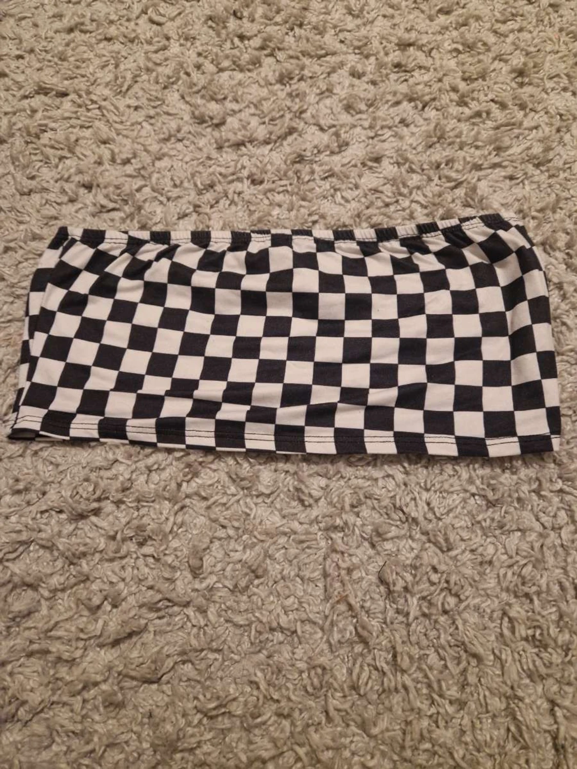 Checker topp