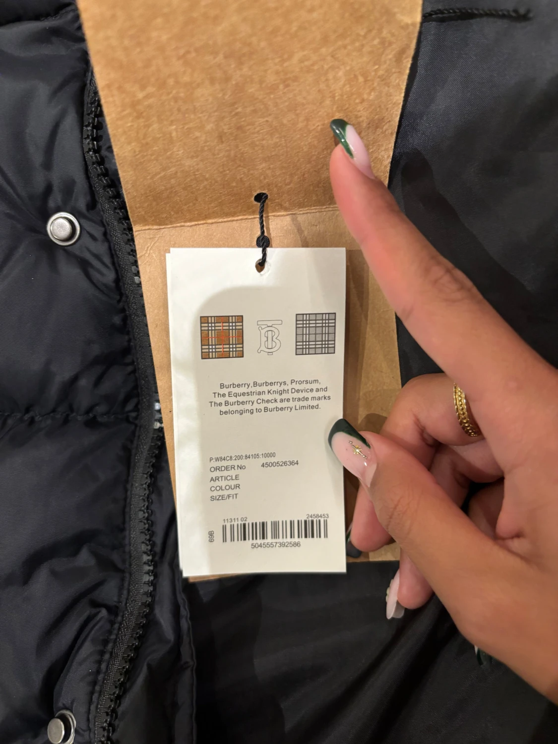 Svart pufferjacka från Burberry - 5