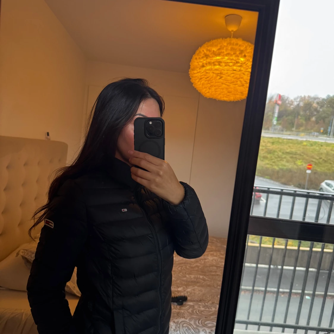 Svart dunjacka Tommy Jeans S