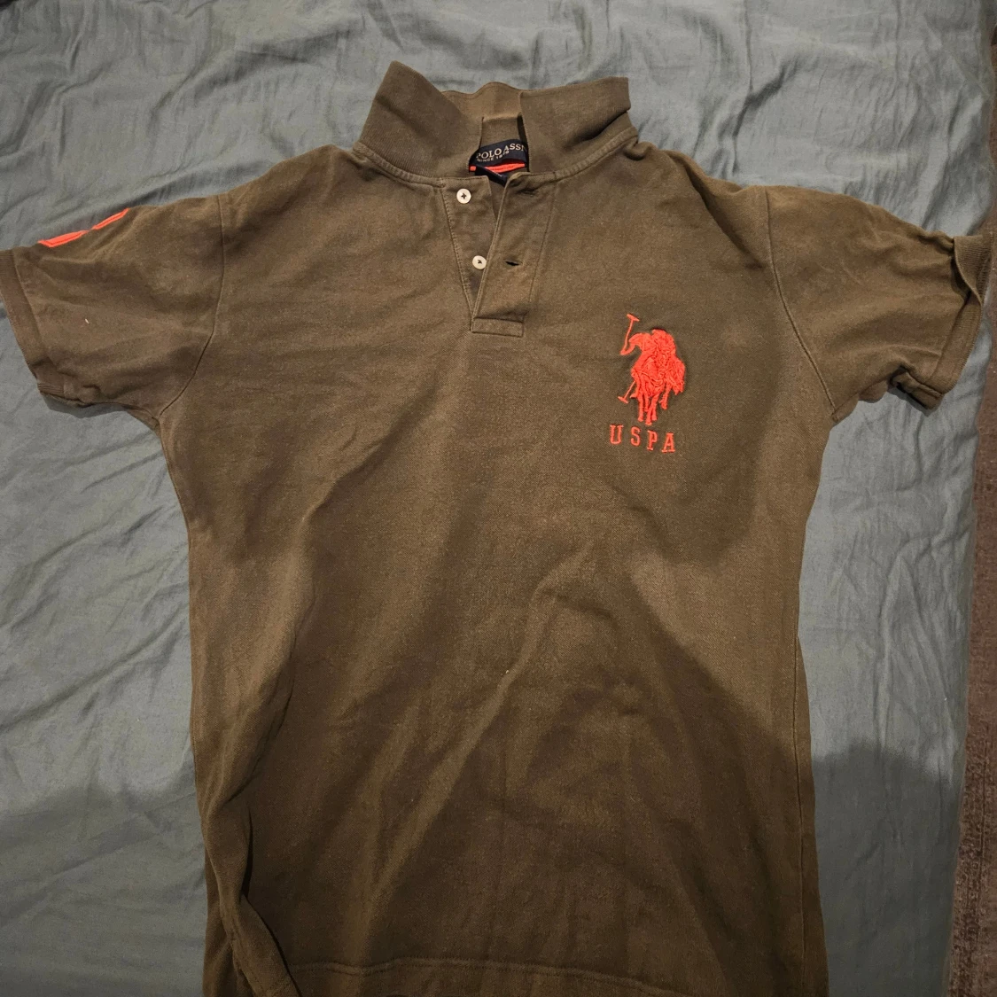 Olivgrön pikétröja från US Polo Assn