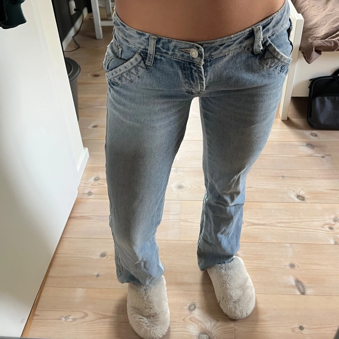 Ljusblå bootcut jeans