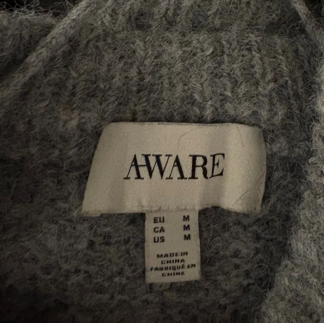Grå stickad tröja från AWARE/Vero Moda  - 1