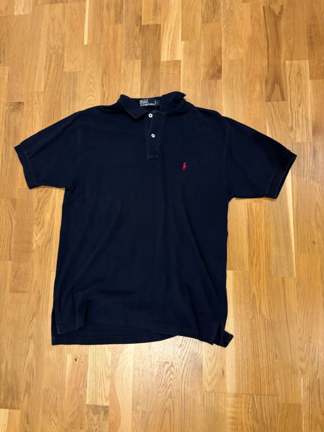 Mörkblå pikétröja från Ralph Lauren