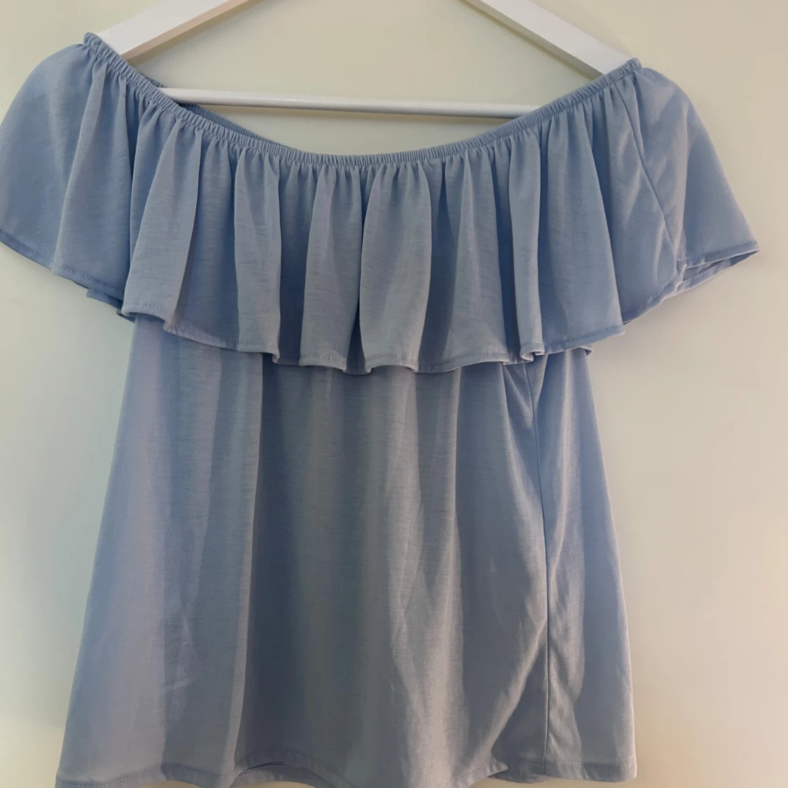 Ljusblå offshoulder topp från H&M