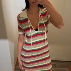 Randig stickad klänning från KITRI - Använd få gånger 