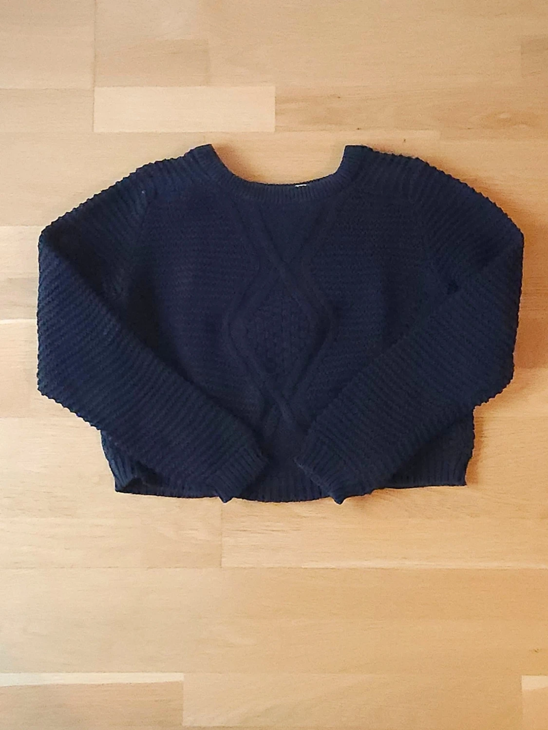 Svart stickad tröja