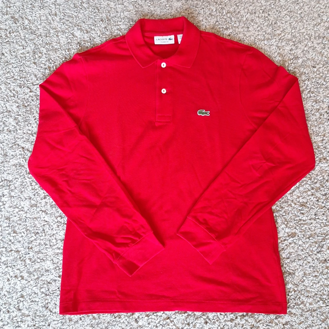 Röd Lacoste långärmad pikétröja 