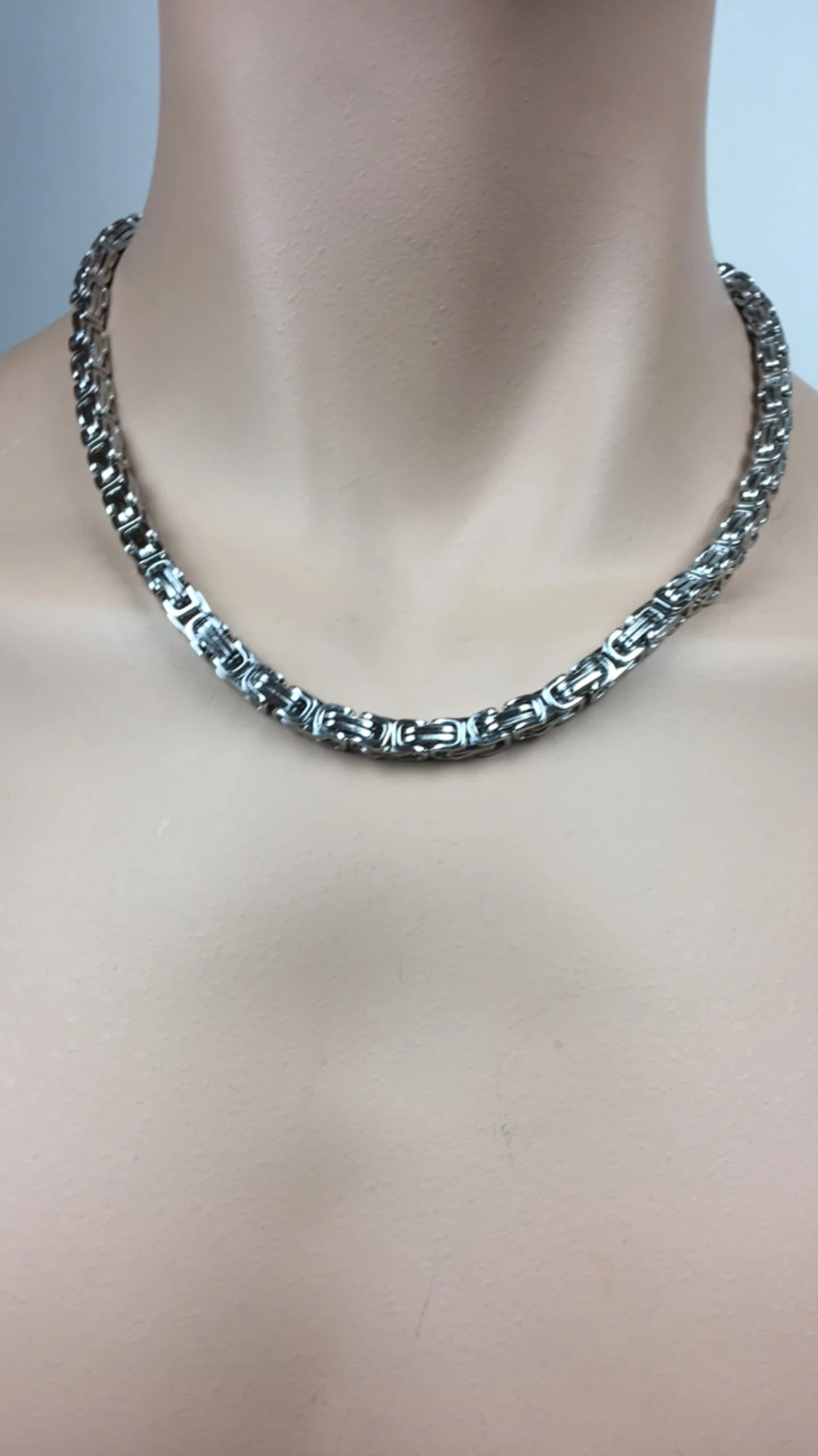 Kejsalänkar i rostfritt stål.