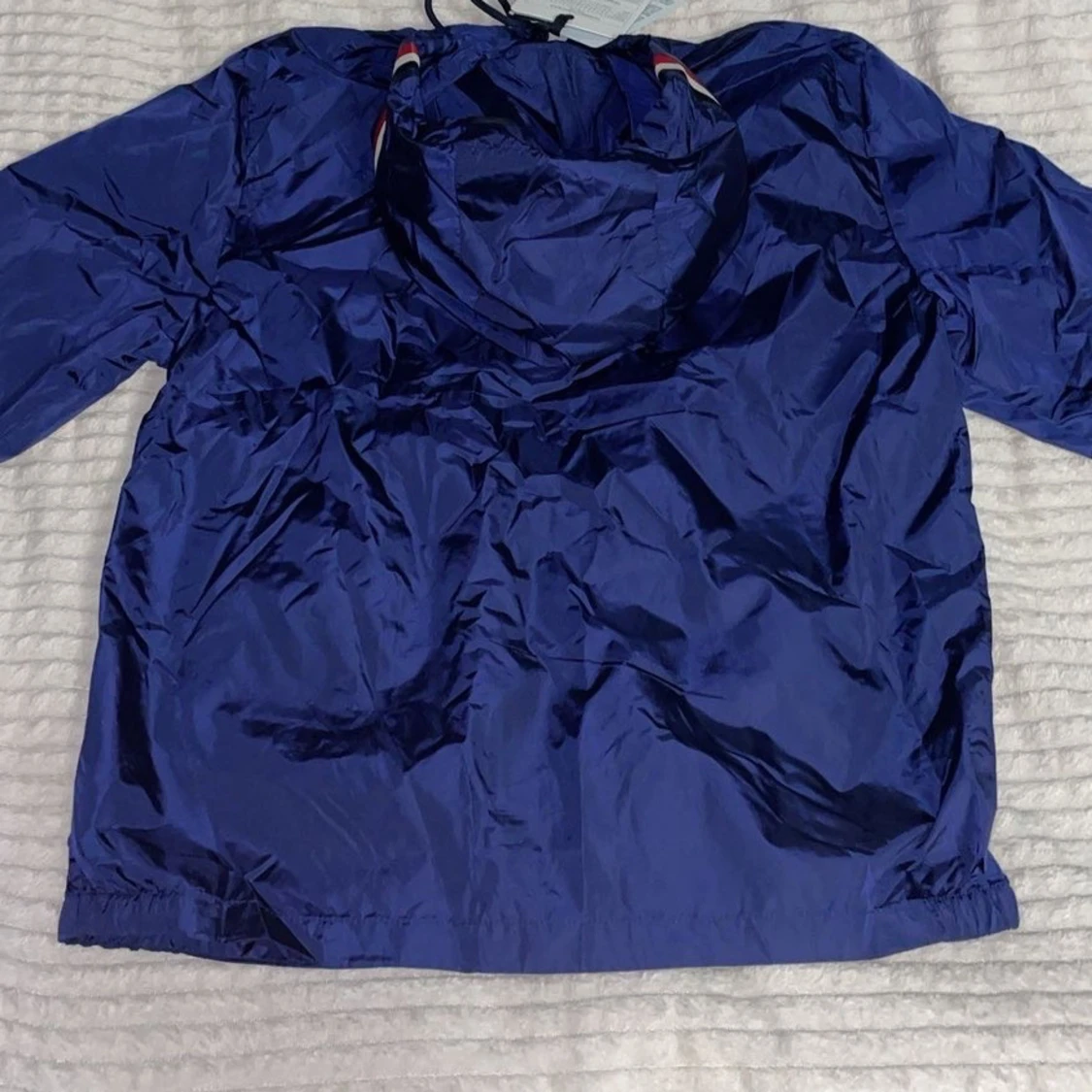 Blå vindjacka från Moncler med huva - 1