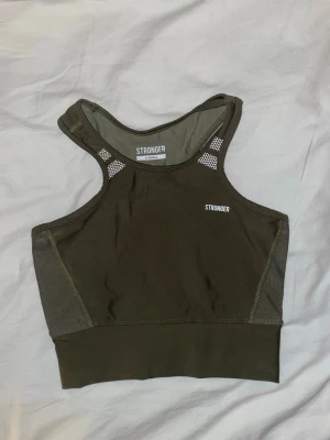 Träningstopp från stronger  - Träningstopp från stronger i xs, mycket fint skick!