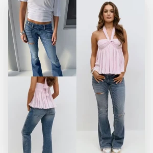 Gina tricot 14+ pleated flare jeans. - Säljer ett par blå bootcut jeans med slitningar på låret pga för stora tyvärr.