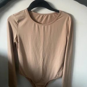 beige body - inte använd 