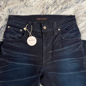 Nudie jeans - Ett par riktigt feta nudie jeans! Modell: Thinn Finn, Stl:W29, inga skador, nypris: ca 1500-2000kr.