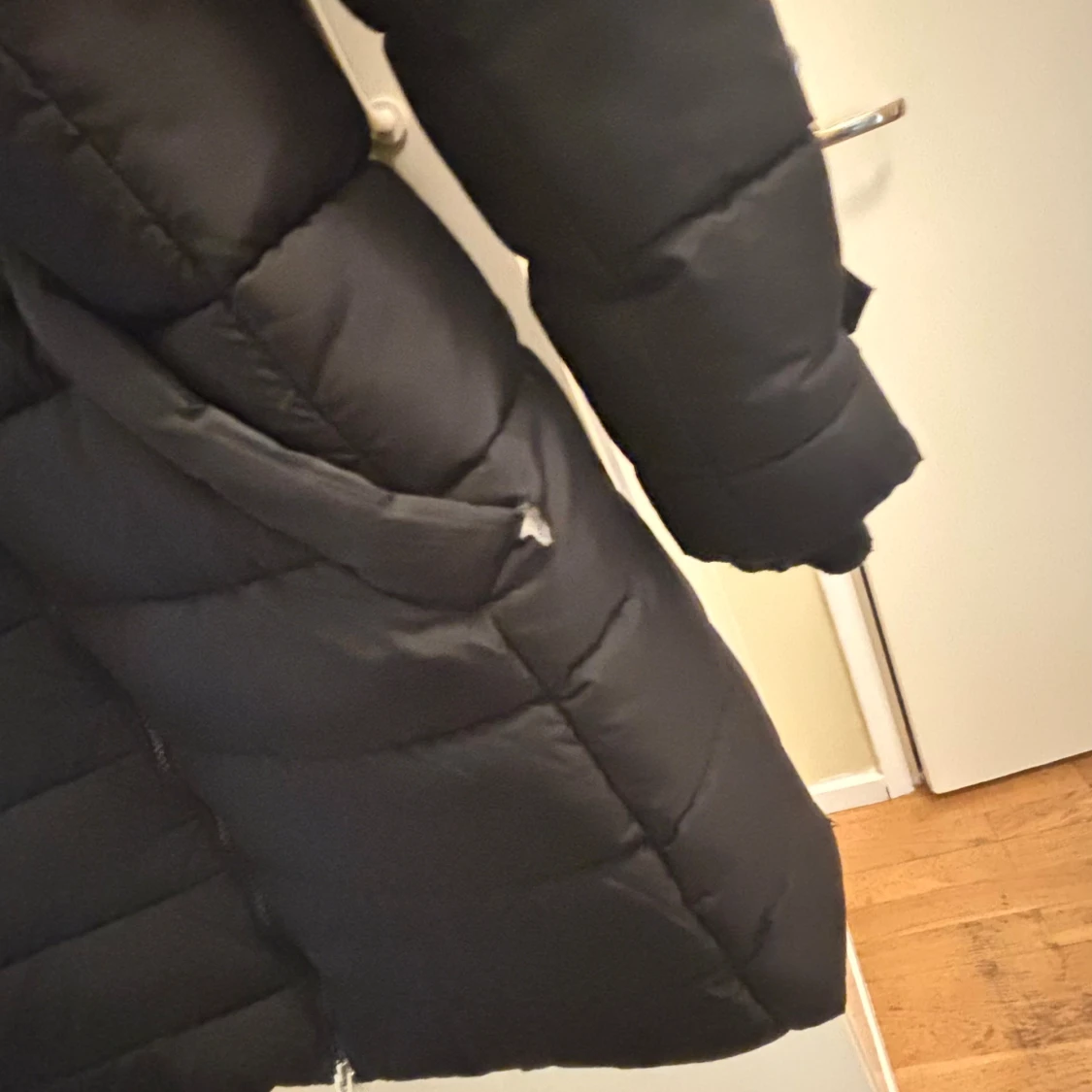 Svart lång dunjacka True North - 2