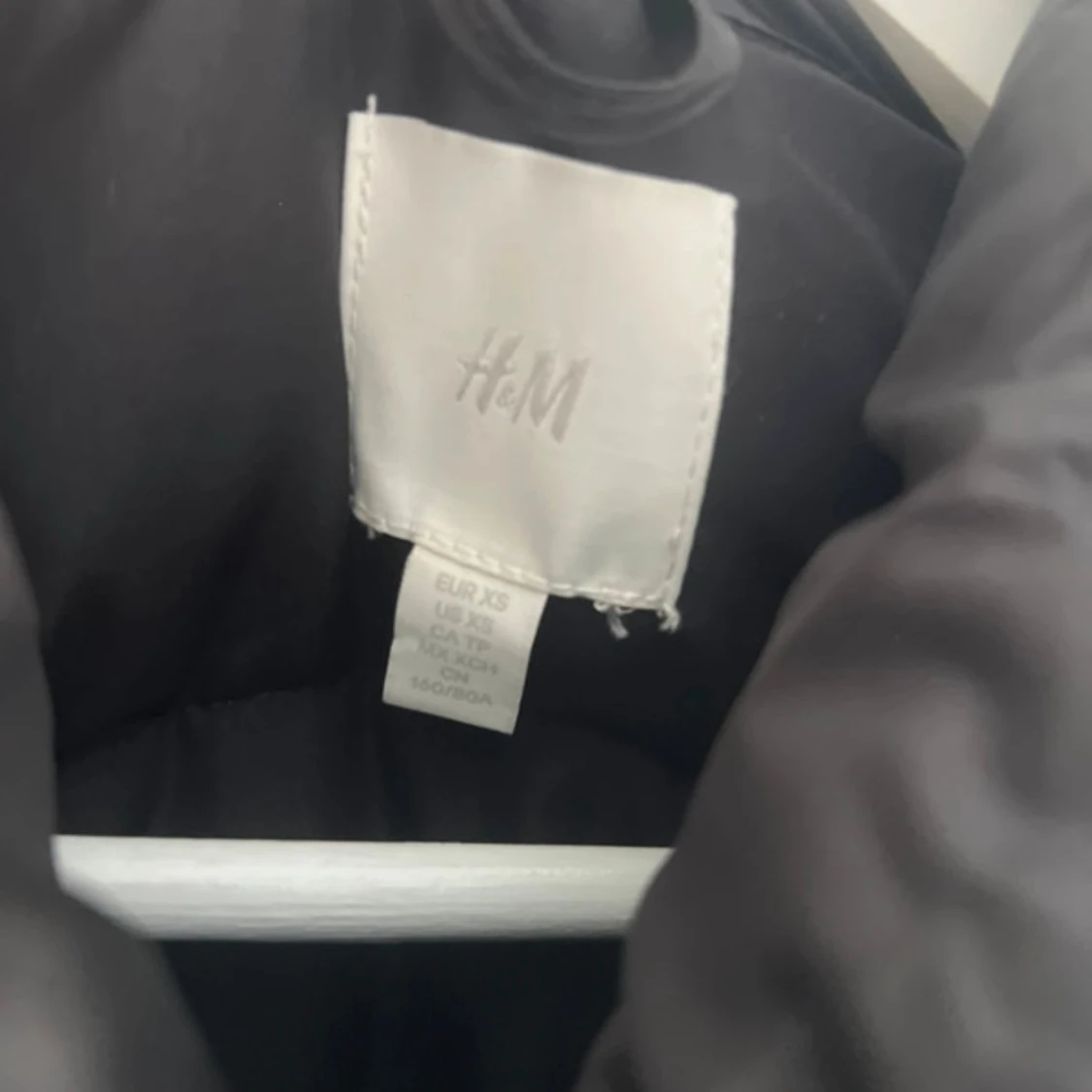 Svart dunväst från H&M XS - 2