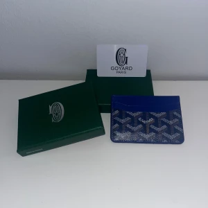 Goyard Plånbok - Helt ny goyard plånbok aldrig använd bara uppvkad ur sin förpackning för att kunna ta bilder skriv om ni har några fler frågor