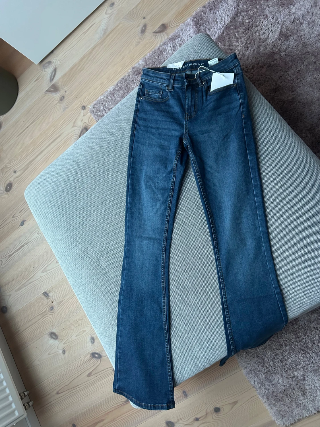 Blå low flare jeans XS/34 NYA