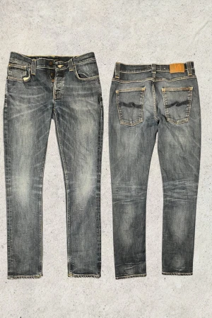 Nudie Jeans - Grim Tim  - Riktigt snygga nudie jeans i modell grim Tim som är en slim modell. Jeansen är i storlek w33 l34 de har riktigt snygg colorway vid fler funderingar är det bara att skriva mvh FABIANFASHION