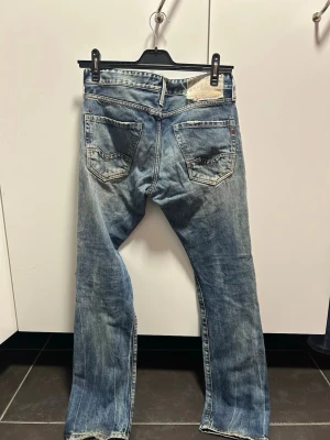 Replay blå jeans med slitningar - kung