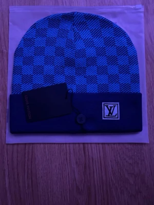 L och v mössa - L och v mössa aldrig använt