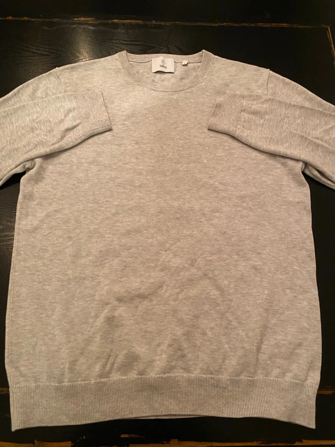 Ljus grå sweatshirt från bläck