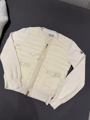 Moncler womens white cardigan jacket S - Like brand new. Bought on Vinted with item verification and came out as 100% real. Please send your offers!